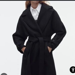 Long black wool blend winter trench coat by Zara. Oversized fit.